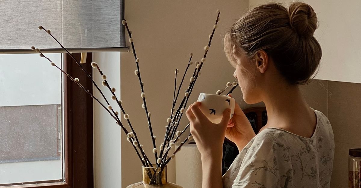 Quiet moment with tea by a window