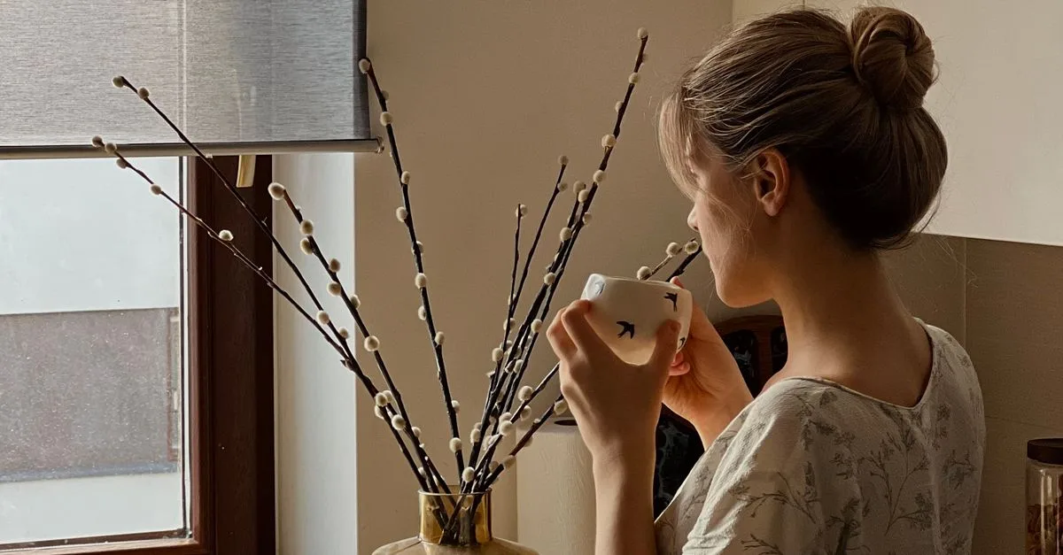 Quiet moment with tea by a window