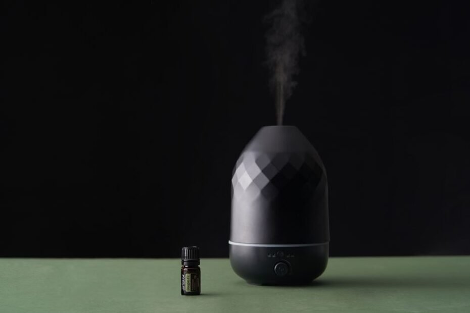 Essential oil diffuser releasing calming mist in spa setting