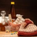 Hot water bottle wrapped in a soft cover, providing warmth and comfort for self-care