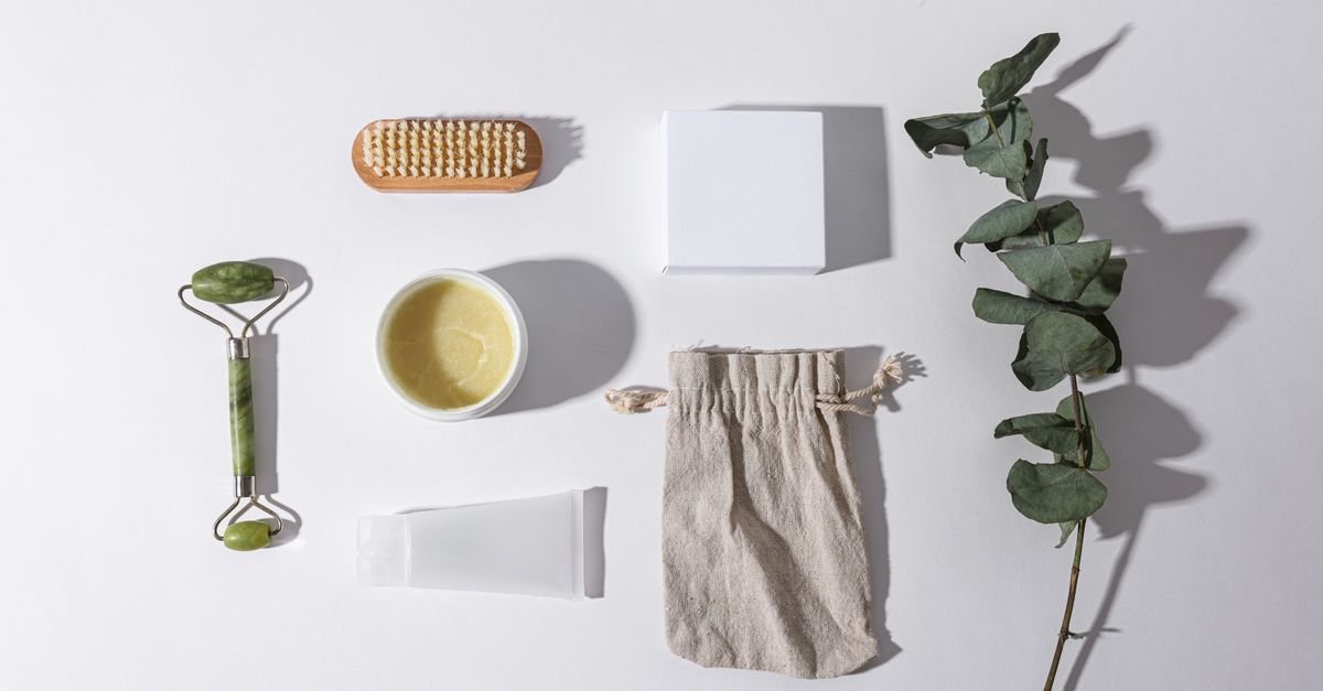 Flat lay of wellness and self-care items on a neutral background