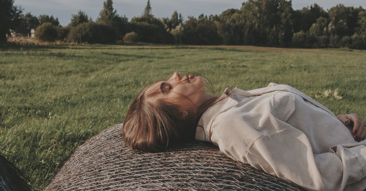 Woman lying back completely relaxed