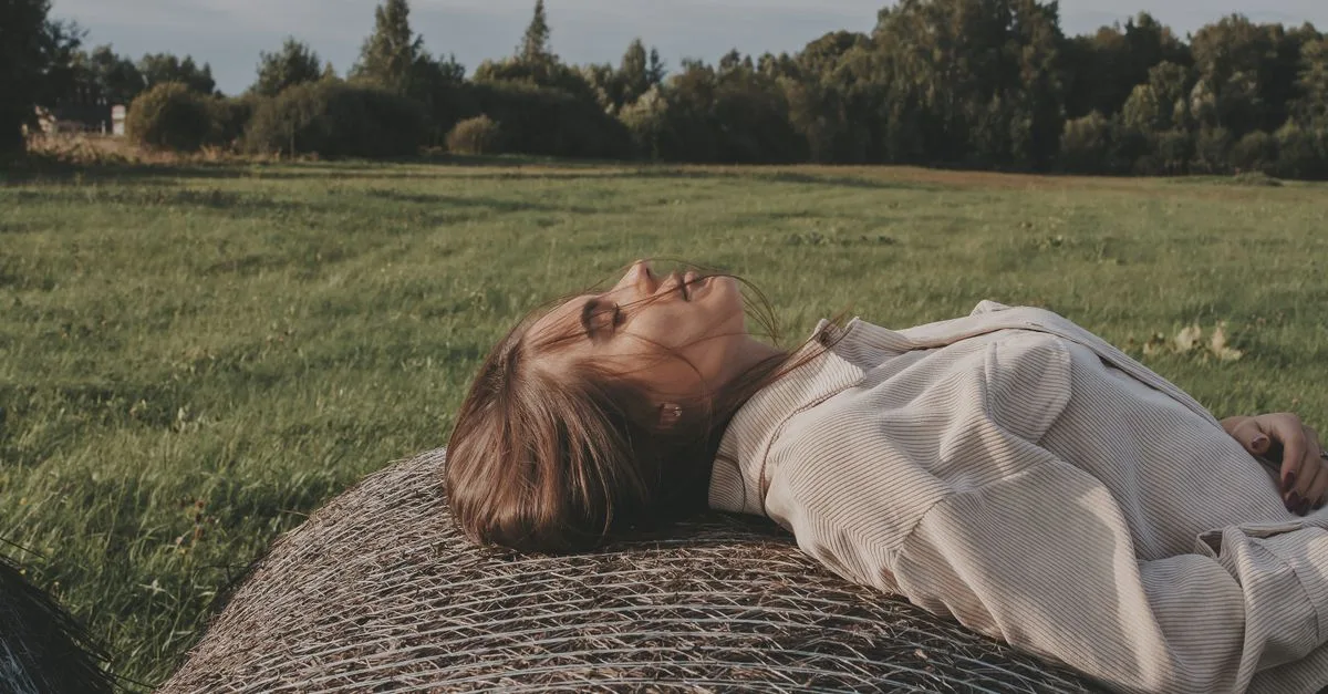 Woman lying back completely relaxed