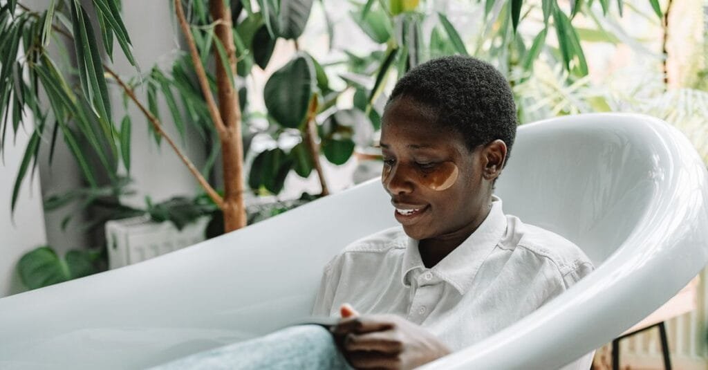Woman relaxing during a self-care bath