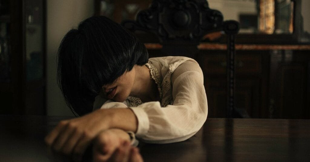 Woman pausing to reflect on her feelings