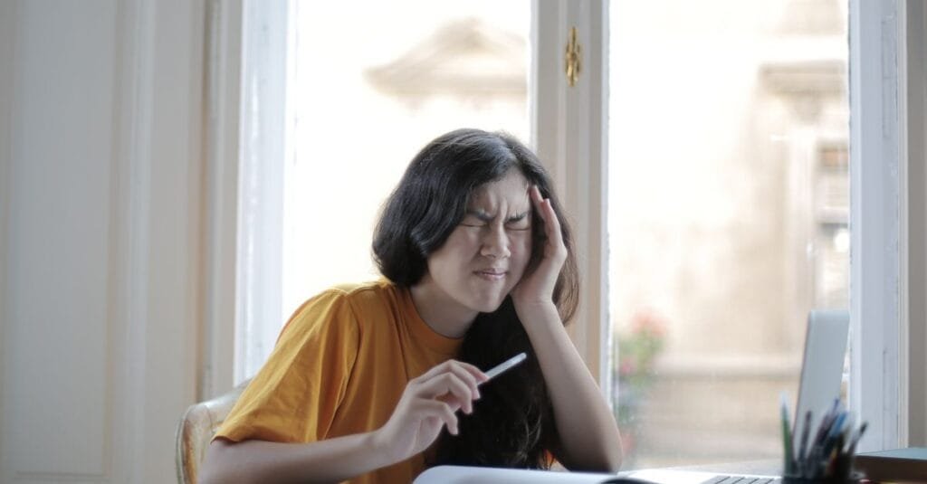 A stressed student doing homework