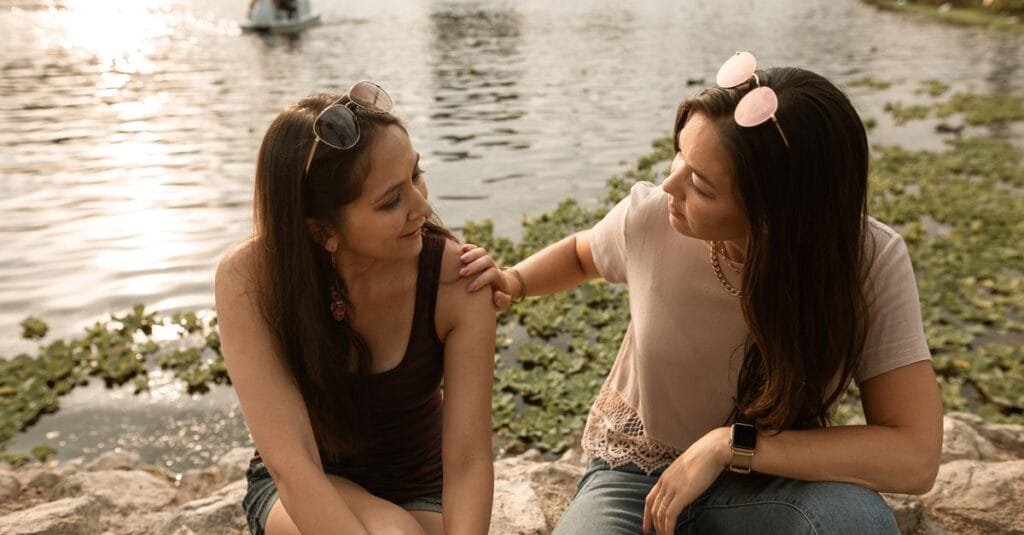Two friends having a heart-to-heart conversation