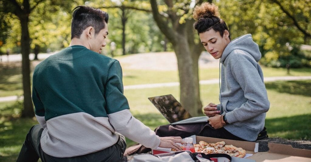 Students studying together outdoors