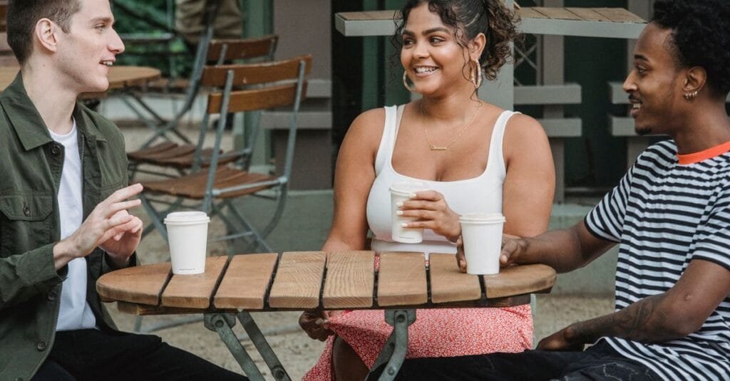 Diverse friends enjoying coffee together