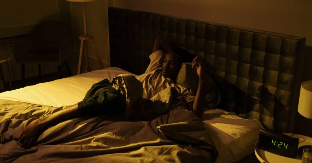 A man lying awake at night