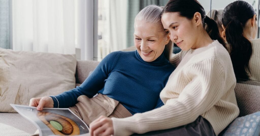 A caregiver and loved one sharing a happy moment