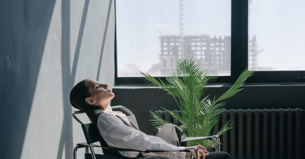 Woman resting quietly by a window