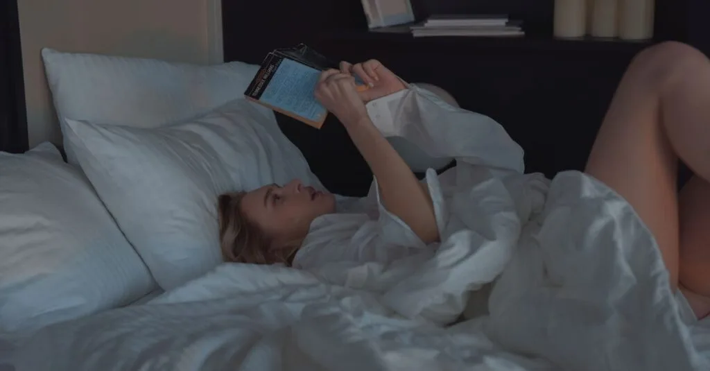 Reading a book in bed to rest